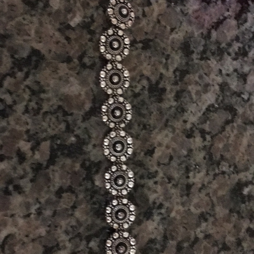 Old Avon magnetic bracelet with matching earrings.